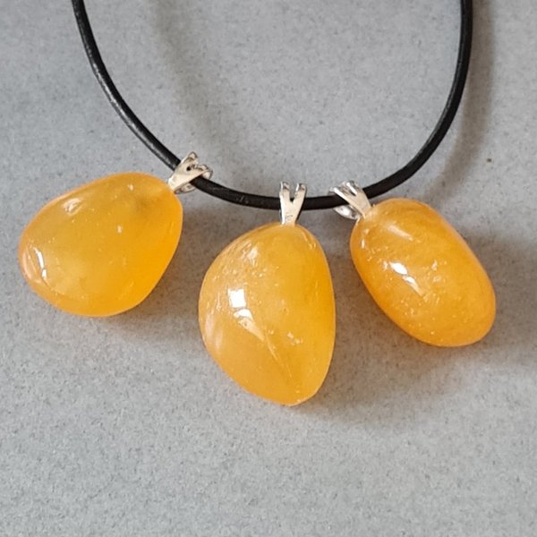 Calcit orange/gelb mit Silberöse